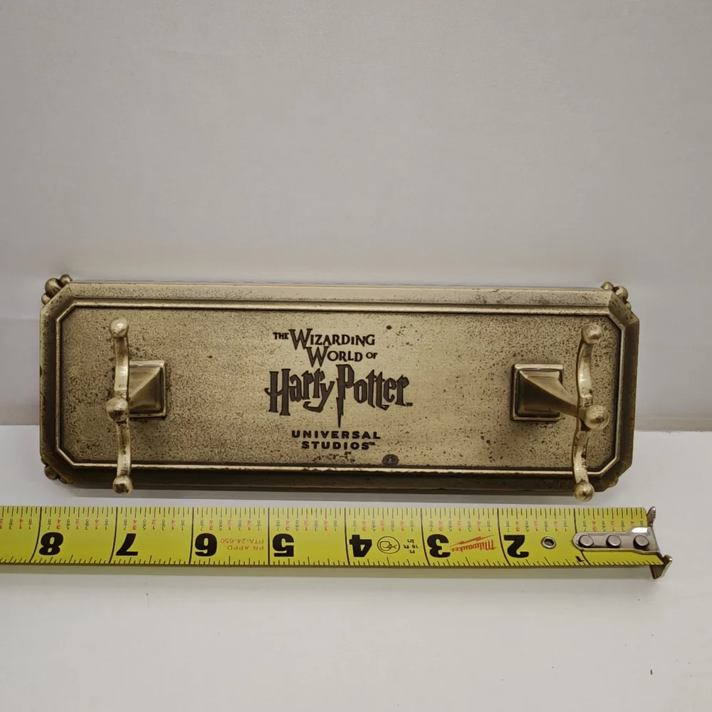 The Wizarding World of Harry Potter Gold Wall Hook Rack - Universal Studios